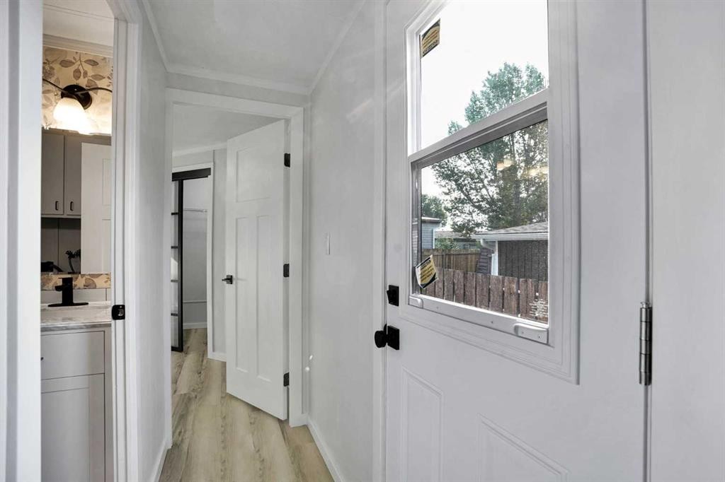 64 Huntwell Way Ne, Calgary, AB - Indoor Photo Showing Other Room