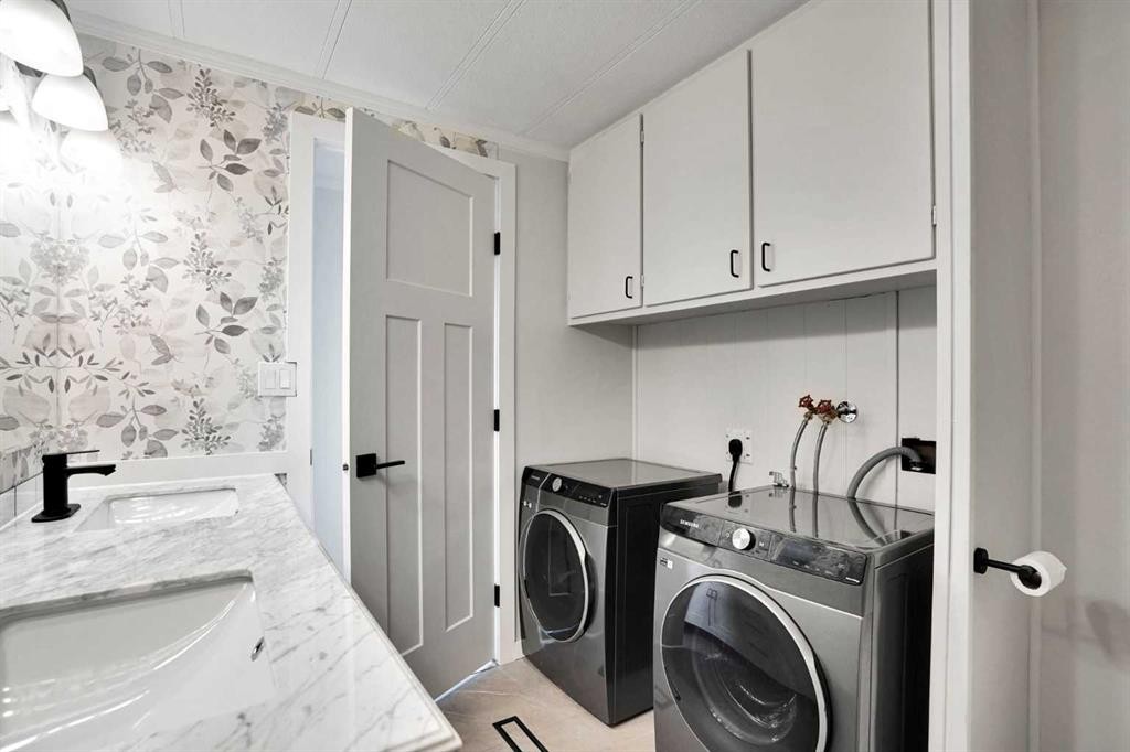 64 Huntwell Way Ne, Calgary, AB - Indoor Photo Showing Laundry Room