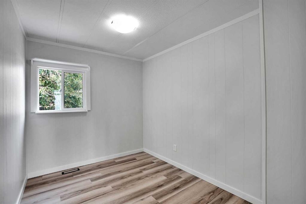 64 Huntwell Way Ne, Calgary, AB - Indoor Photo Showing Other Room