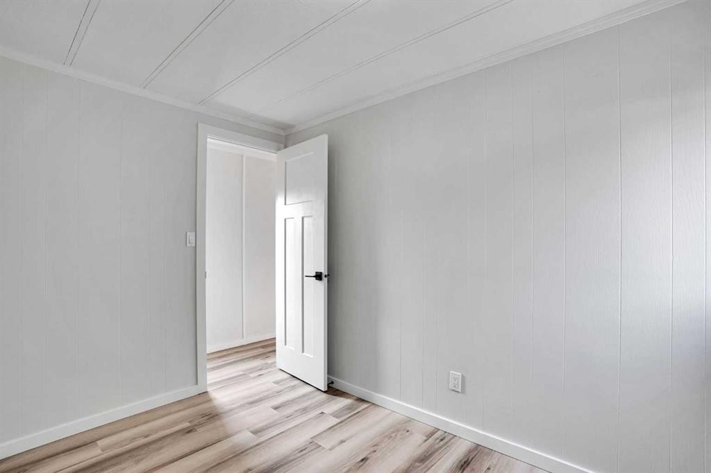 64 Huntwell Way Ne, Calgary, AB - Indoor Photo Showing Other Room
