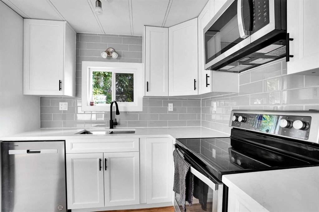 64 Huntwell Way Ne, Calgary, AB - Indoor Photo Showing Kitchen With Upgraded Kitchen