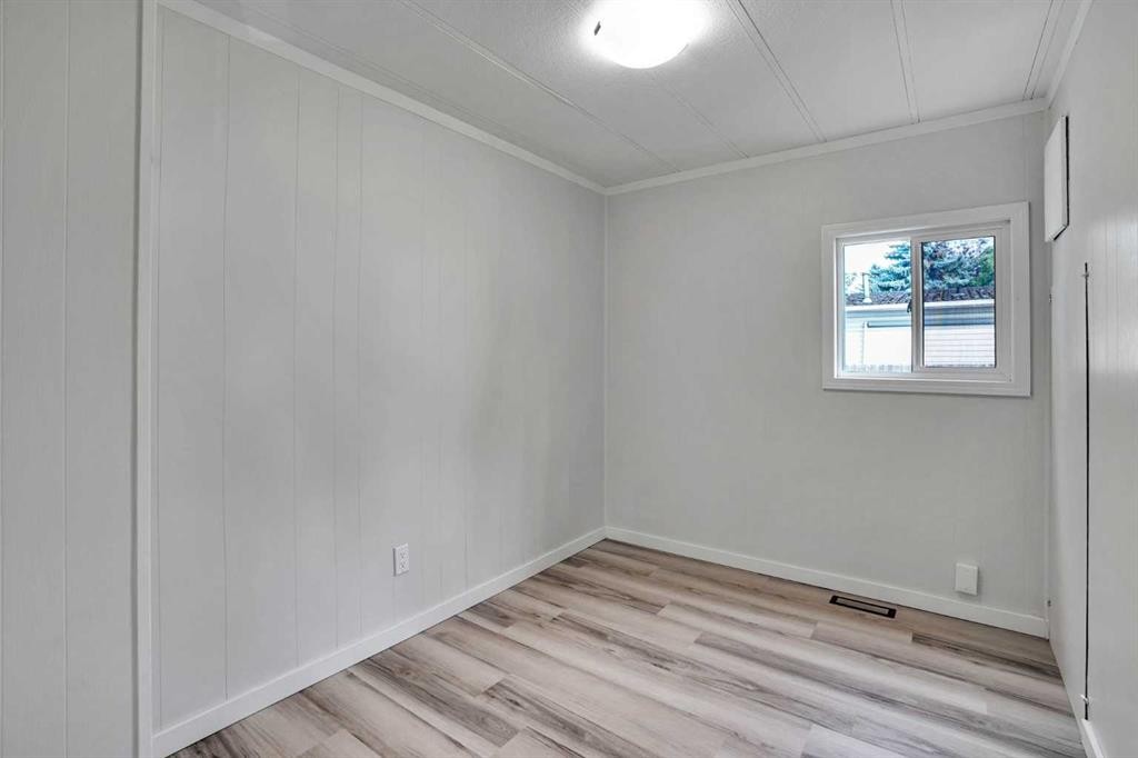 64 Huntwell Way Ne, Calgary, AB - Indoor Photo Showing Other Room