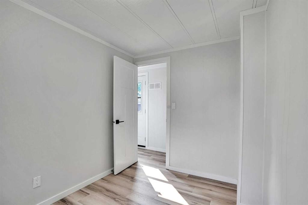 64 Huntwell Way Ne, Calgary, AB - Indoor Photo Showing Other Room