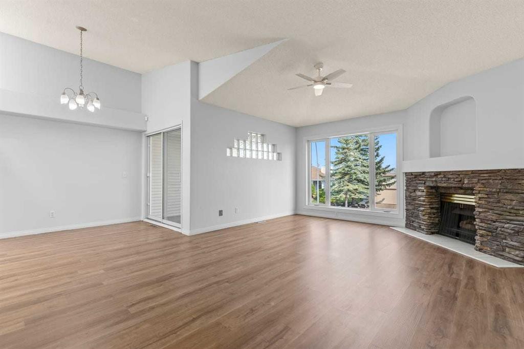162 Millbank Hill Sw, Calgary, AB - Indoor Photo Showing Living Room With Fireplace