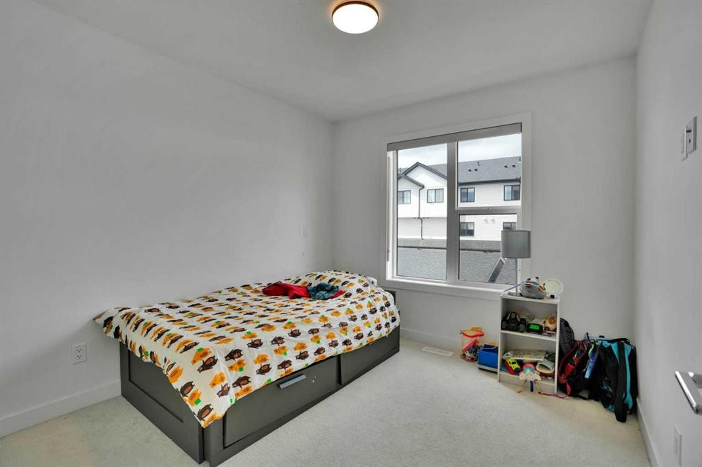 76 Amblefield Terrace Nw, Calgary, AB - Indoor Photo Showing Bedroom