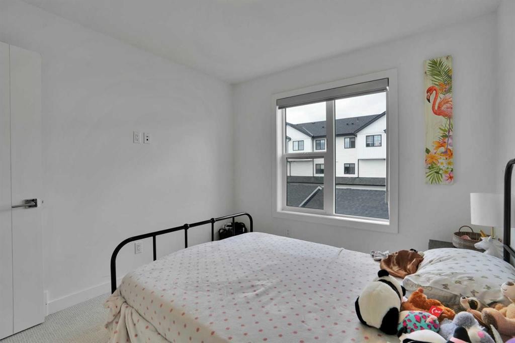 76 Amblefield Terrace Nw, Calgary, AB - Indoor Photo Showing Bedroom