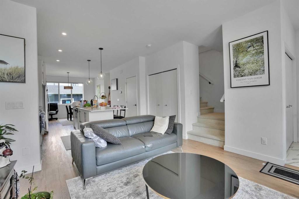 76 Amblefield Terrace Nw, Calgary, AB - Indoor Photo Showing Living Room