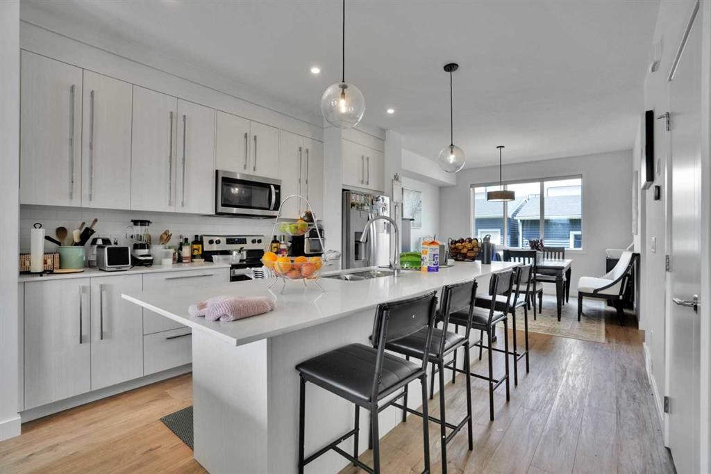 76 Amblefield Terrace Nw, Calgary, AB - Indoor Photo Showing Kitchen With Double Sink With Upgraded Kitchen