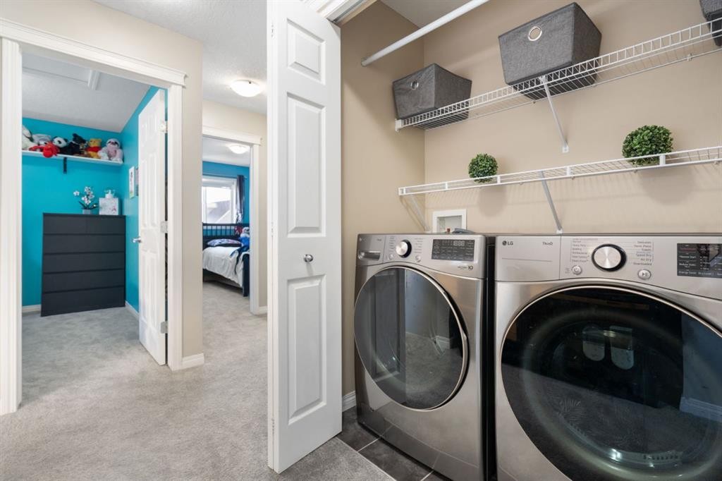 70 Walden Manor Se, Calgary, AB - Indoor Photo Showing Laundry Room