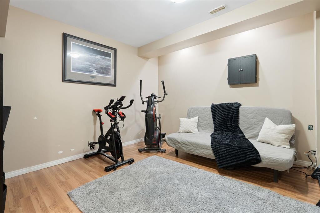70 Walden Manor Se, Calgary, AB - Indoor Photo Showing Gym Room
