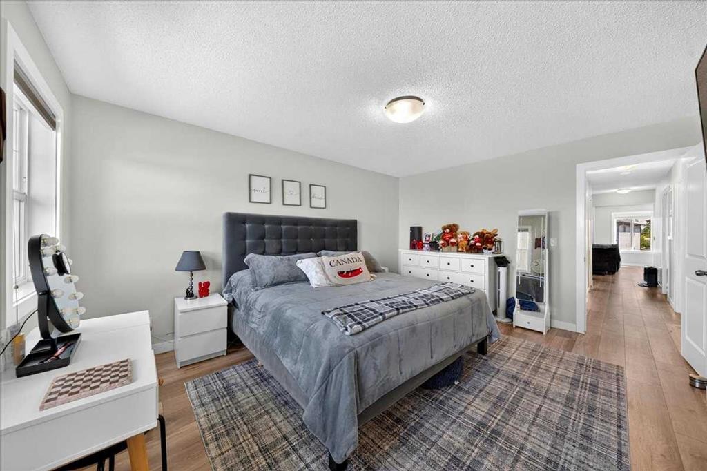 251 Hillcrest Circle Sw, Airdrie, AB - Indoor Photo Showing Bedroom