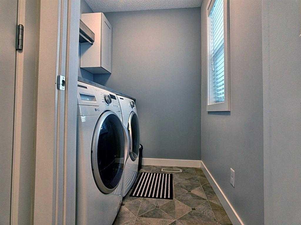 251 Hillcrest Circle Sw, Airdrie, AB - Indoor Photo Showing Laundry Room