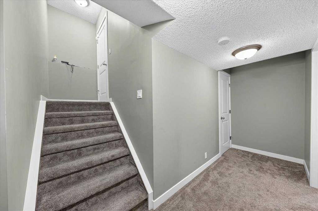 251 Hillcrest Circle Sw, Airdrie, AB - Indoor Photo Showing Other Room
