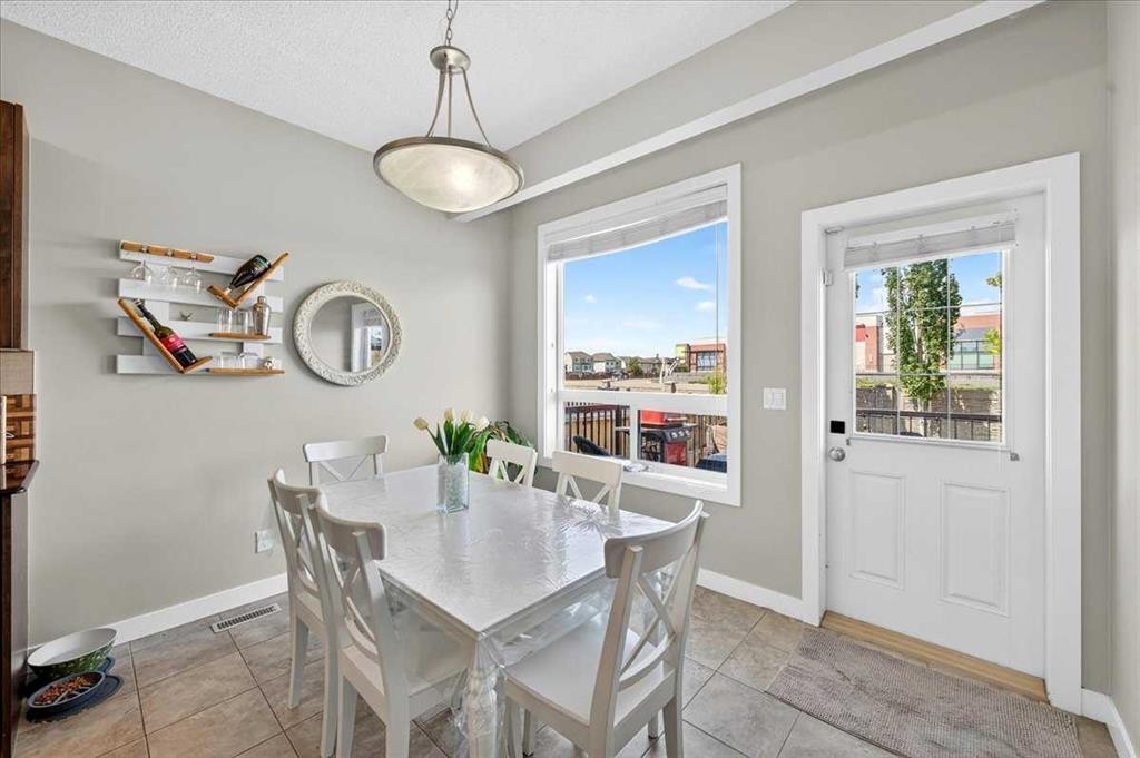251 Hillcrest Circle Sw, Airdrie, AB - Indoor Photo Showing Dining Room