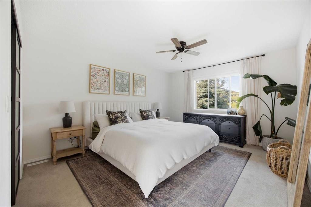 100 Bow Ridge Crescent, Cochrane, AB - Indoor Photo Showing Bedroom