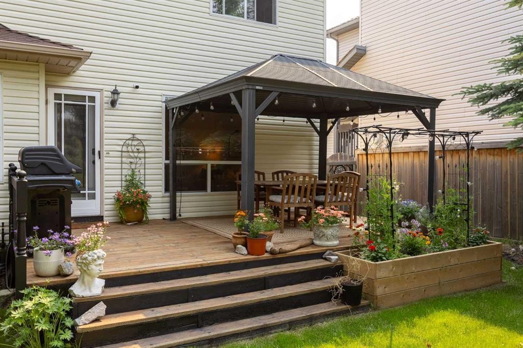 100 Bow Ridge Crescent, Cochrane, AB - Outdoor With Deck Patio Veranda