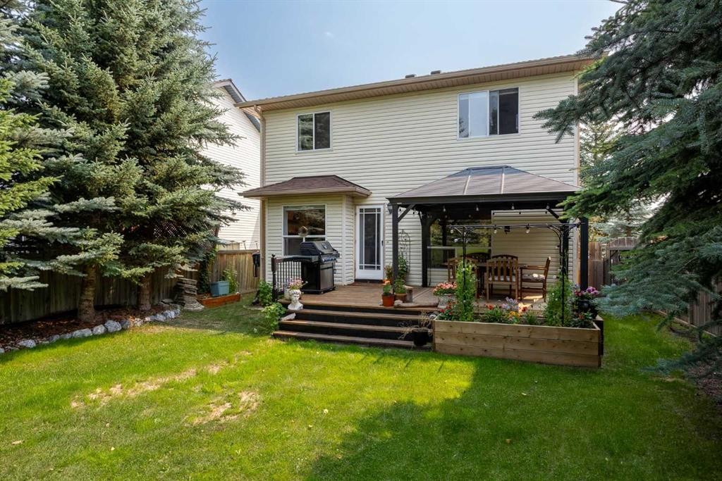 100 Bow Ridge Crescent, Cochrane, AB - Outdoor With Deck Patio Veranda