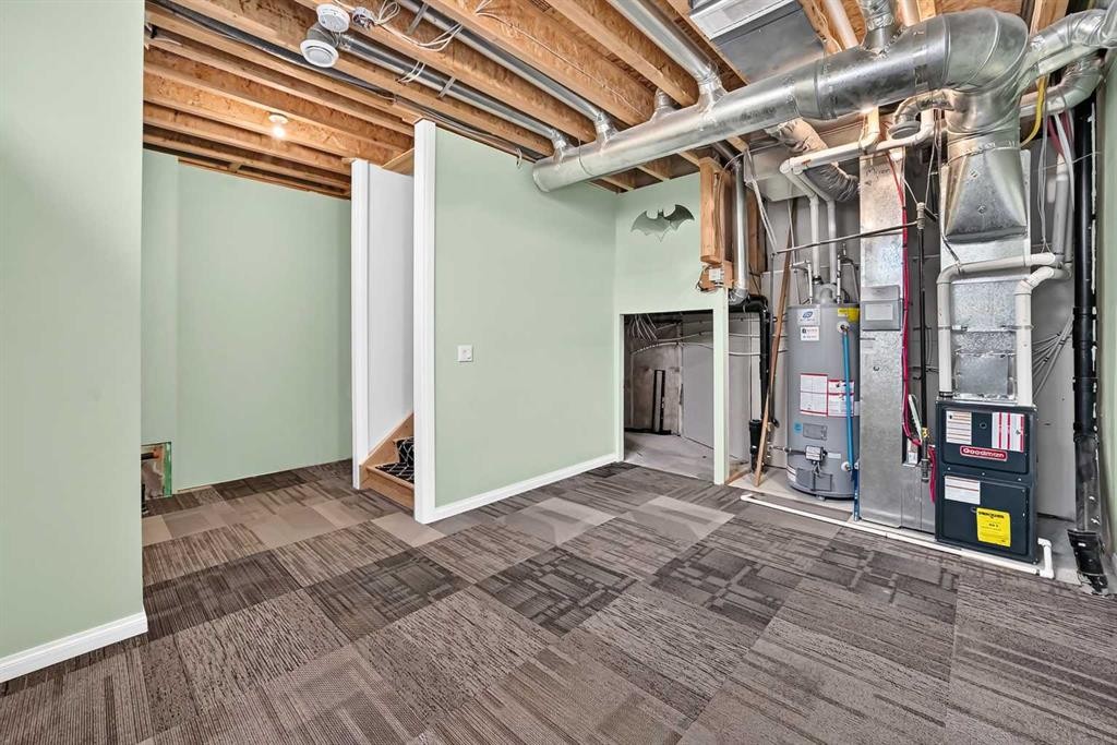 1803-1530 Bayside Avenue, Airdrie, AB - Indoor Photo Showing Basement