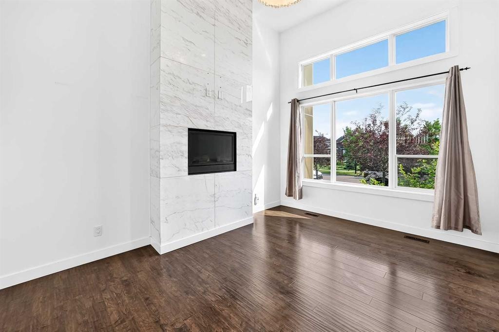 1803-1530 Bayside Avenue, Airdrie, AB - Indoor With Fireplace