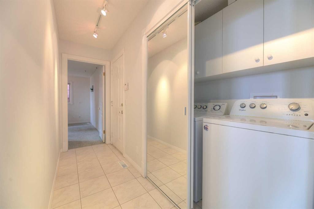 8 Prominence Path Sw, Calgary, AB - Indoor Photo Showing Laundry Room