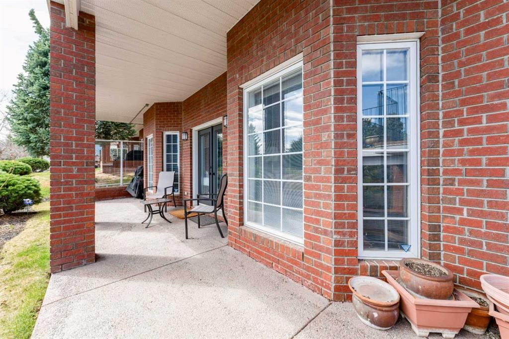 8 Prominence Path Sw, Calgary, AB - Outdoor With Deck Patio Veranda With Exterior