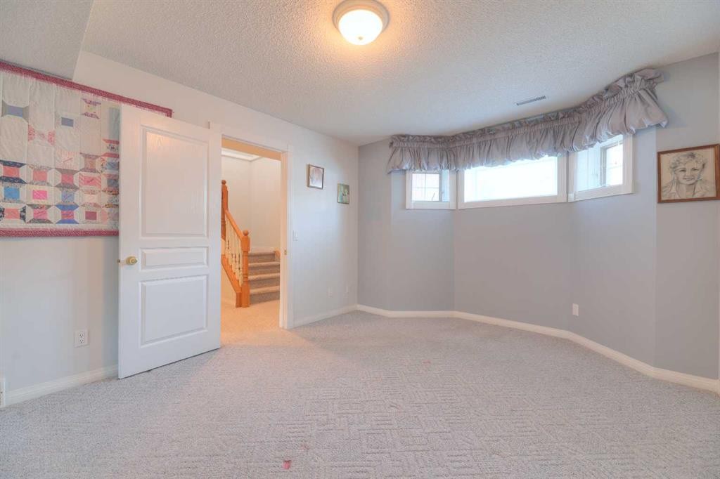 8 Prominence Path Sw, Calgary, AB - Indoor Photo Showing Other Room