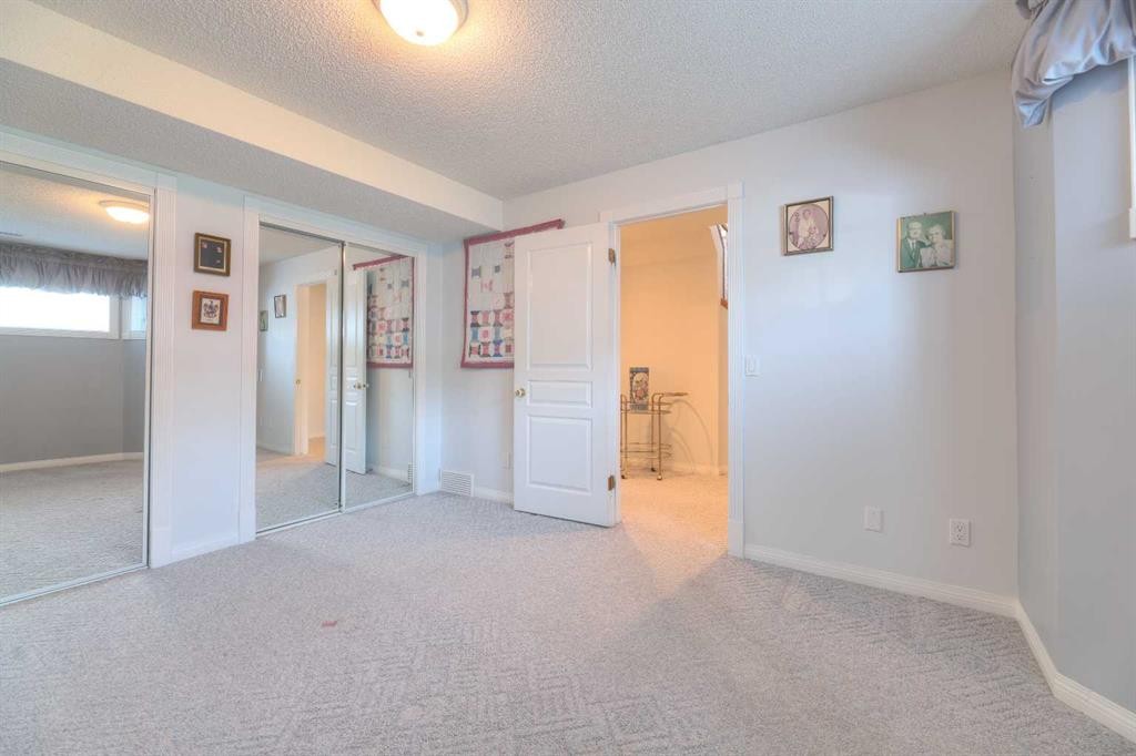 8 Prominence Path Sw, Calgary, AB - Indoor Photo Showing Other Room