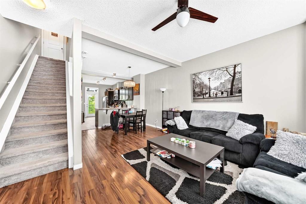 60 New Brighton Point Se, Calgary, AB - Indoor Photo Showing Living Room