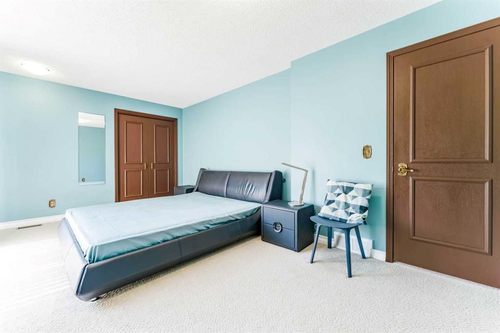 240 Canterville Drive Sw, Calgary, AB - Indoor Photo Showing Bedroom