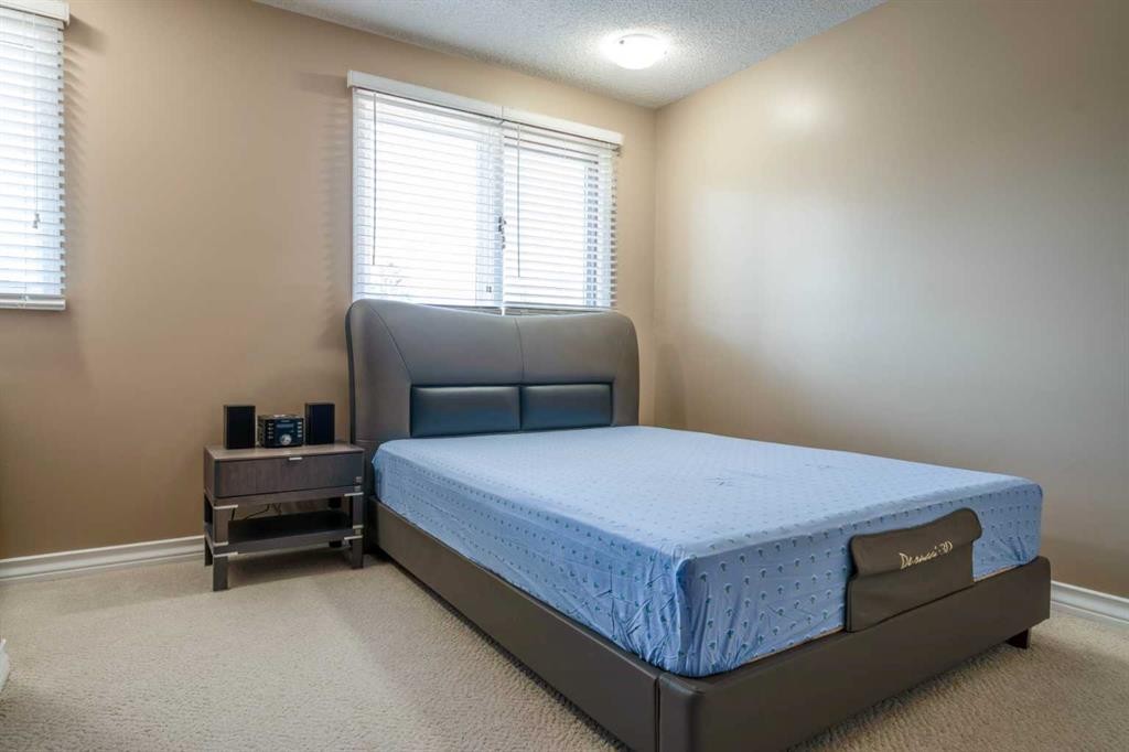 240 Canterville Drive Sw, Calgary, AB - Indoor Photo Showing Bedroom