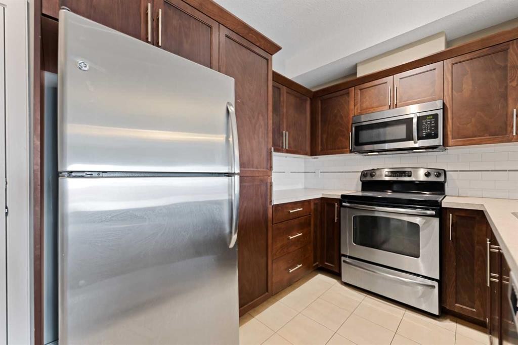 205-20 Royal Oak Plaza Nw, Calgary, AB - Indoor Photo Showing Kitchen With Stainless Steel Kitchen