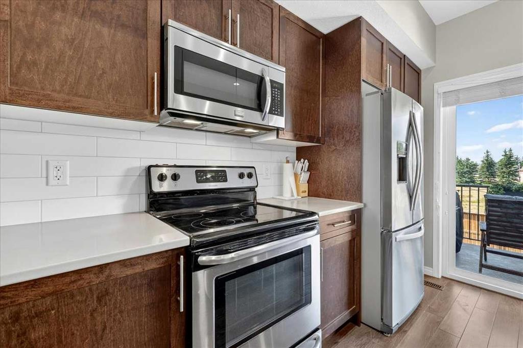 2003-280 Williamstown Close Nw, Airdrie, AB - Indoor Photo Showing Kitchen With Stainless Steel Kitchen