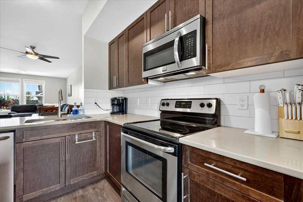 2003-280 Williamstown Close Nw, Airdrie, AB - Indoor Photo Showing Kitchen With Stainless Steel Kitchen