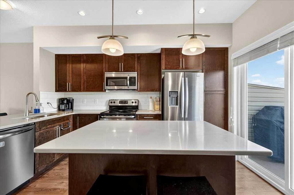 2003-280 Williamstown Close Nw, Airdrie, AB - Indoor Photo Showing Kitchen With Stainless Steel Kitchen With Upgraded Kitchen