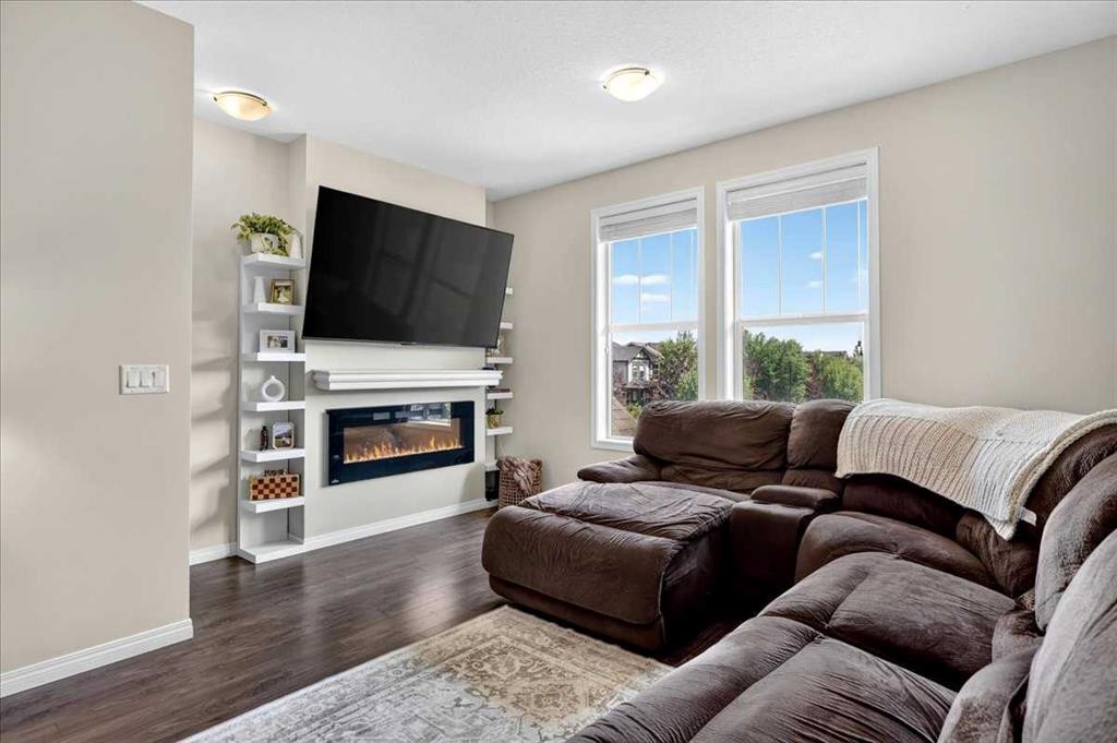 2003-280 Williamstown Close Nw, Airdrie, AB - Indoor Photo Showing Living Room With Fireplace