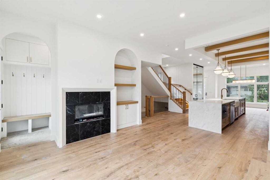 2609 5 Avenue Nw, Calgary, AB - Indoor Photo Showing Other Room With Fireplace