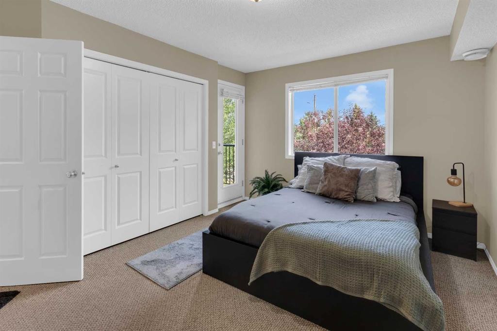 411-140 Sagewood Boulevard Sw, Airdrie, AB - Indoor Photo Showing Bedroom