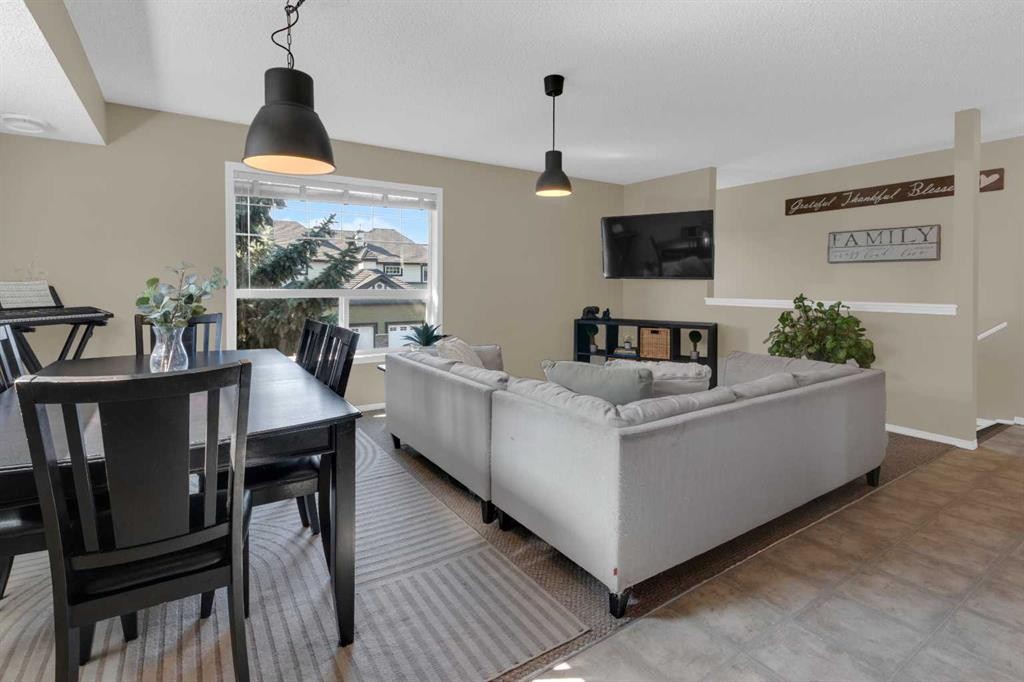411-140 Sagewood Boulevard Sw, Airdrie, AB - Indoor With Fireplace