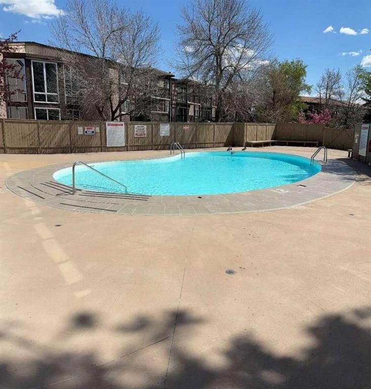 108-816 89 Avenue Sw, Calgary, AB - Outdoor With In Ground Pool