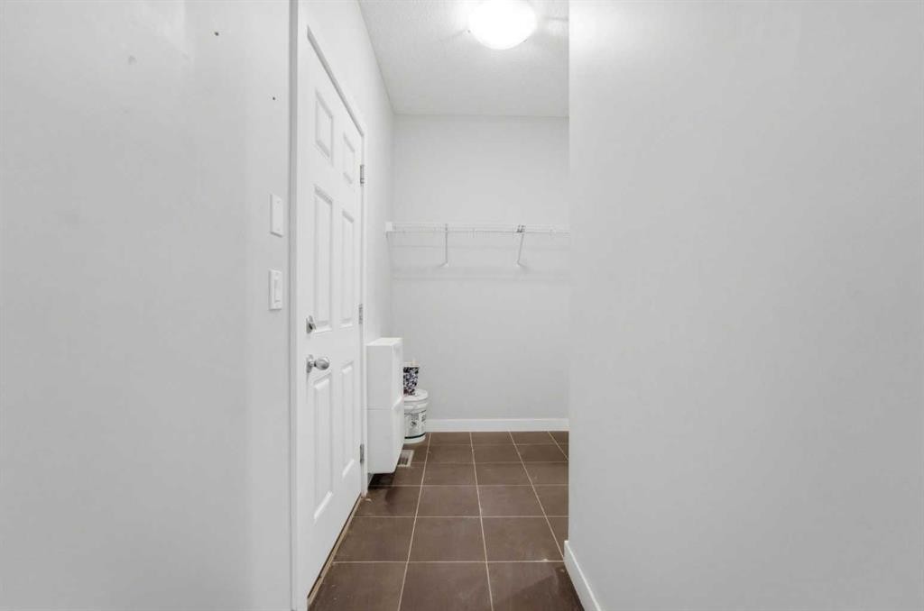 174 Morningside Circle Sw, Airdrie, AB - Indoor Photo Showing Other Room