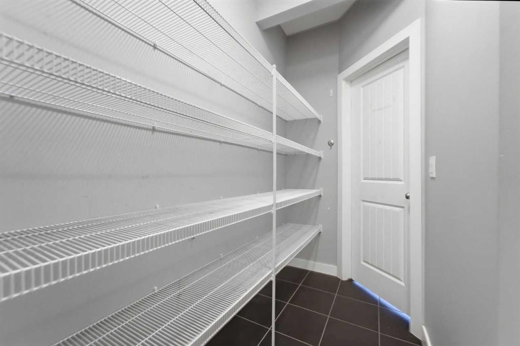 174 Morningside Circle Sw, Airdrie, AB - Indoor With Storage