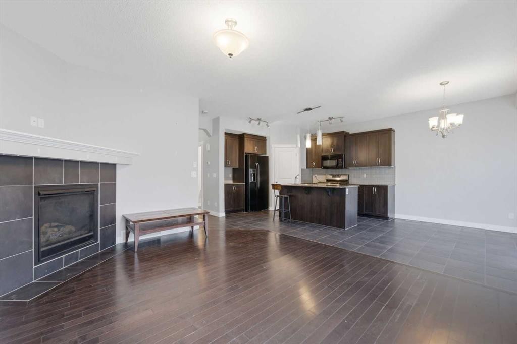 174 Morningside Circle Sw, Airdrie, AB - Indoor With Fireplace