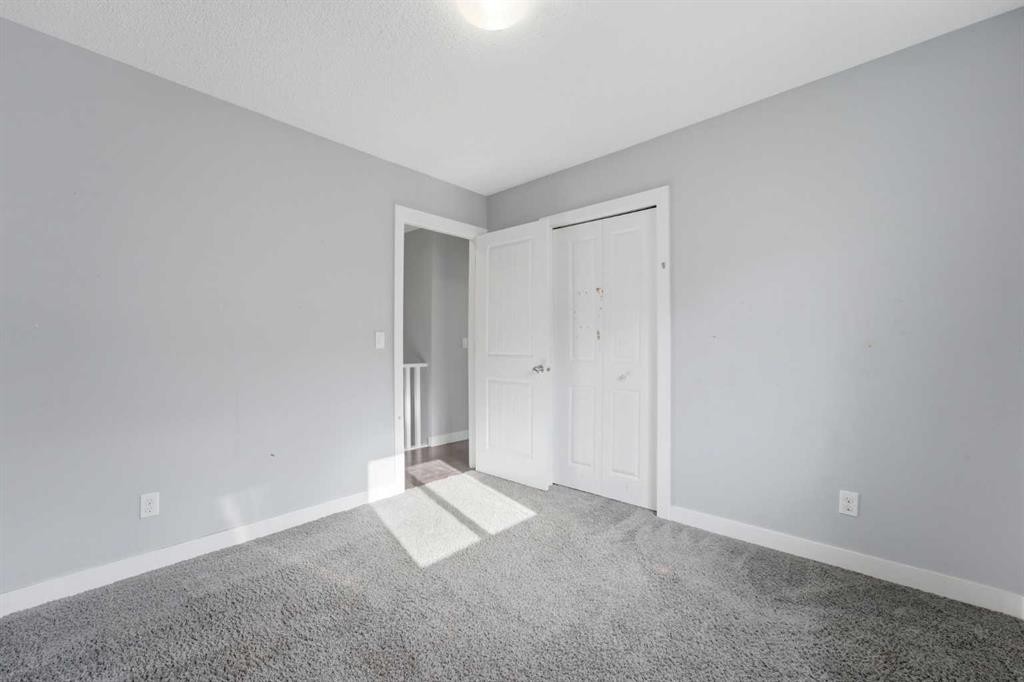 174 Morningside Circle Sw, Airdrie, AB - Indoor Photo Showing Other Room