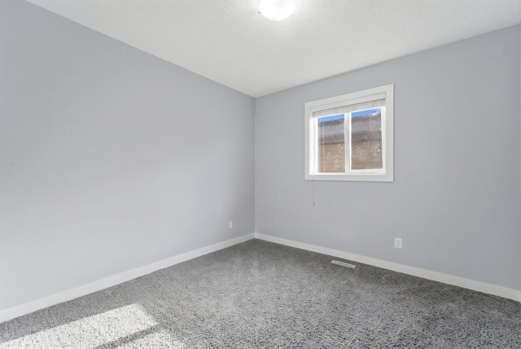 174 Morningside Circle Sw, Airdrie, AB - Indoor Photo Showing Other Room