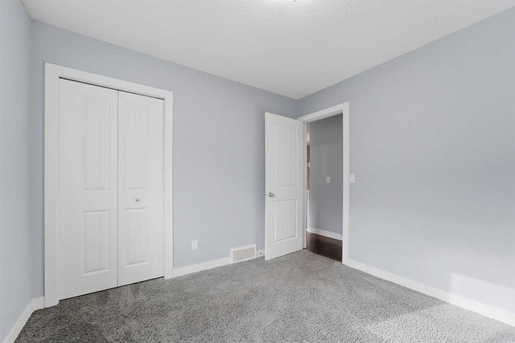 174 Morningside Circle Sw, Airdrie, AB - Indoor Photo Showing Other Room