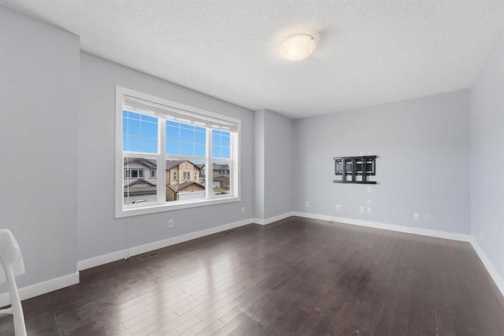 174 Morningside Circle Sw, Airdrie, AB - Indoor Photo Showing Other Room
