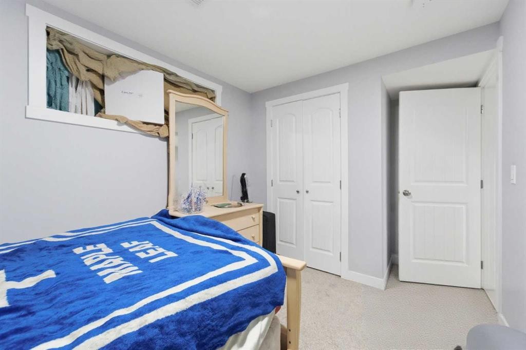 174 Morningside Circle Sw, Airdrie, AB - Indoor Photo Showing Bedroom