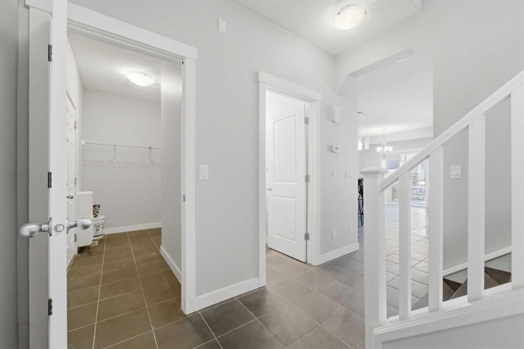 174 Morningside Circle Sw, Airdrie, AB - Indoor Photo Showing Other Room