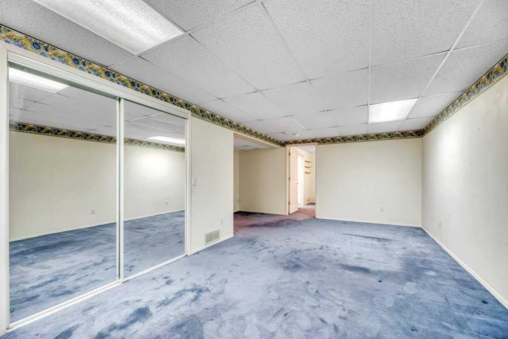 33 Riverview Point Se, Calgary, AB - Indoor Photo Showing Basement