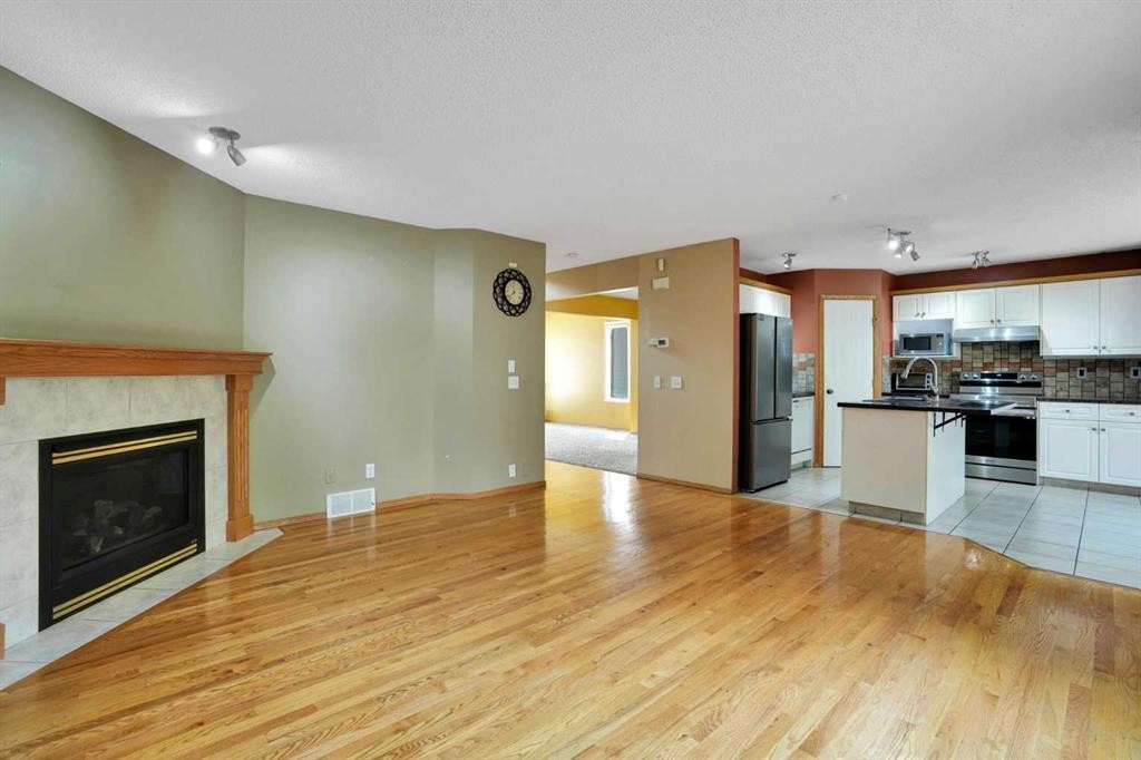 332 Harvest Hills Drive Ne, Calgary, AB - Indoor With Fireplace